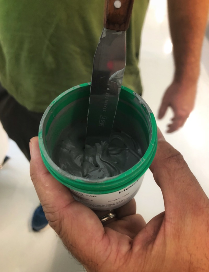 Container of solder paste for soldering electronic components